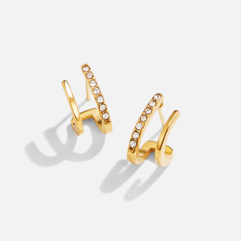 Zendaya – Pendientes de cristal en forma de garra en oro de 18K