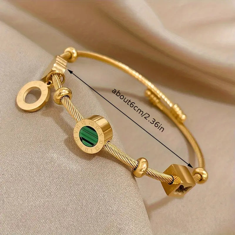 Rhian – Pulsera dorada de firma