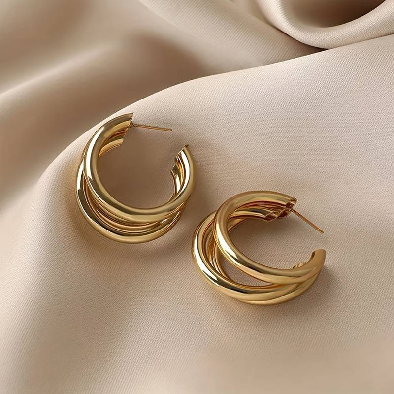 Aro de tres ruedas - 3 aros dorados