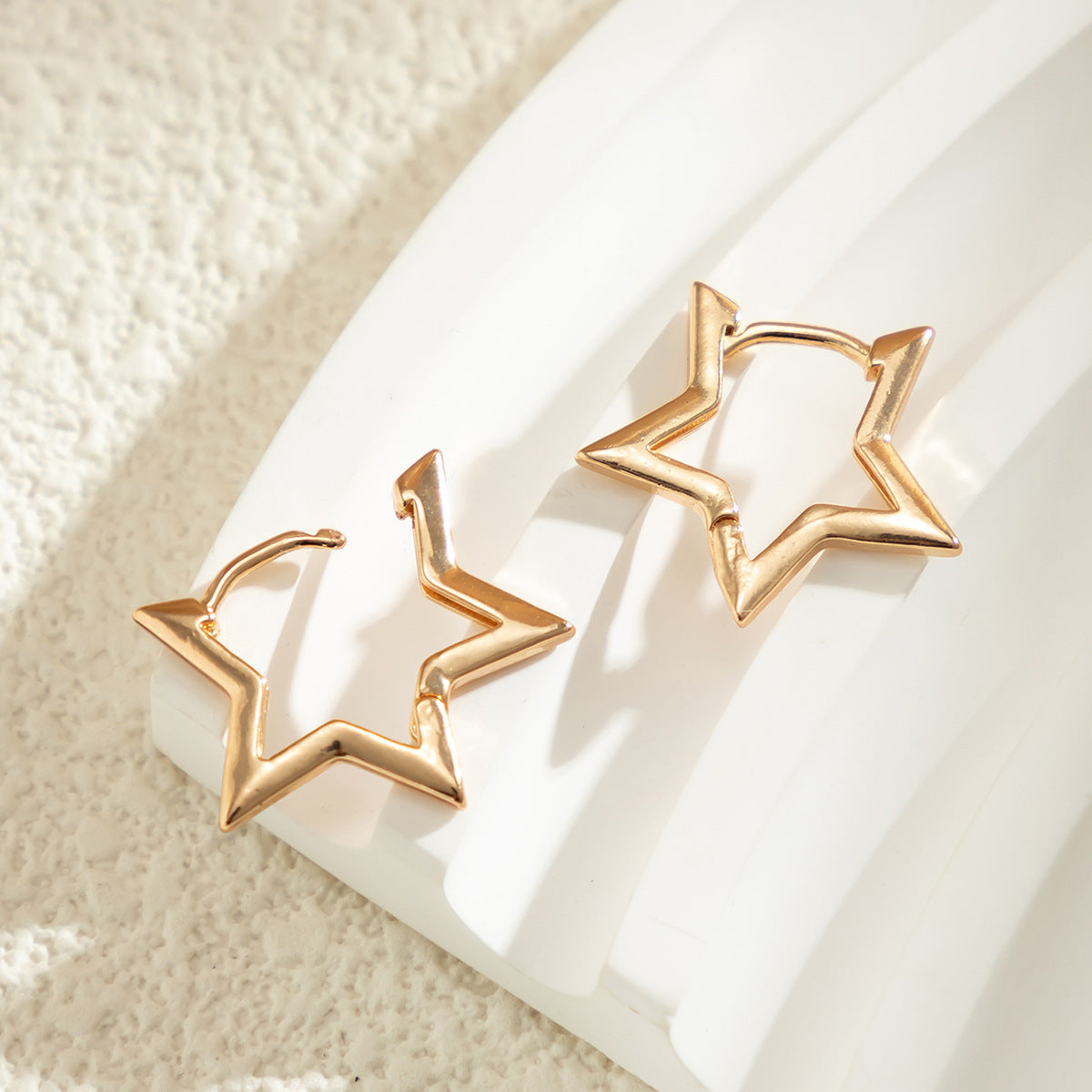 Pendientes Huggie Star - Aros de estrella