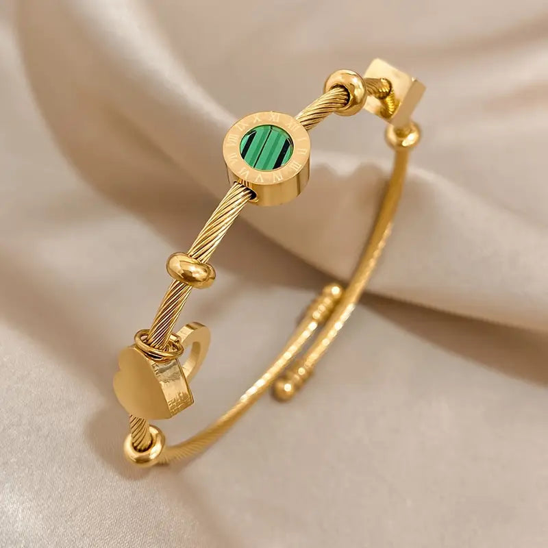 Rhian – Pulsera dorada de firma