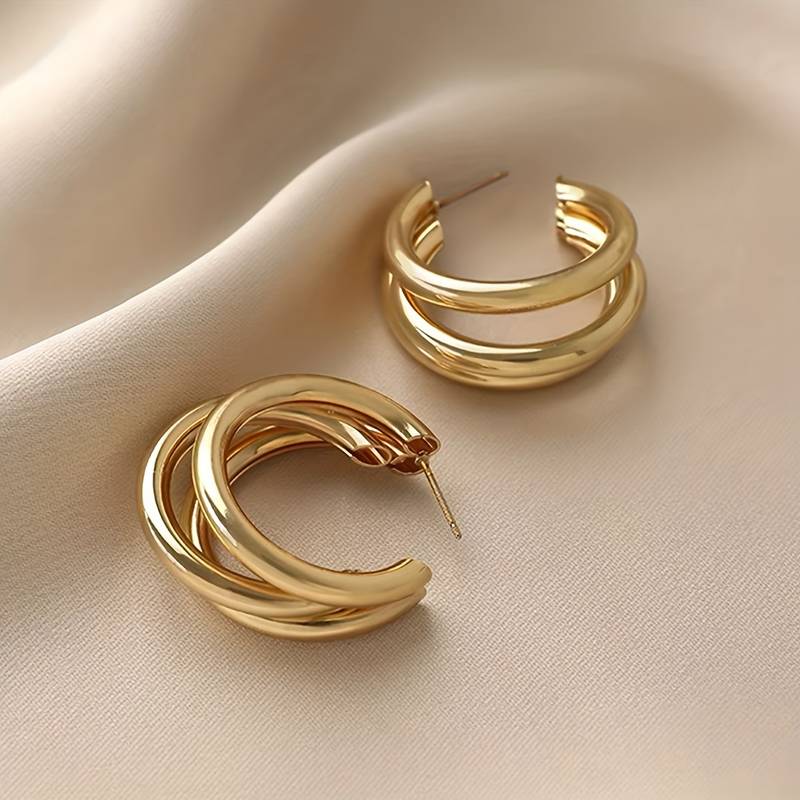 Aro de tres ruedas - 3 aros dorados