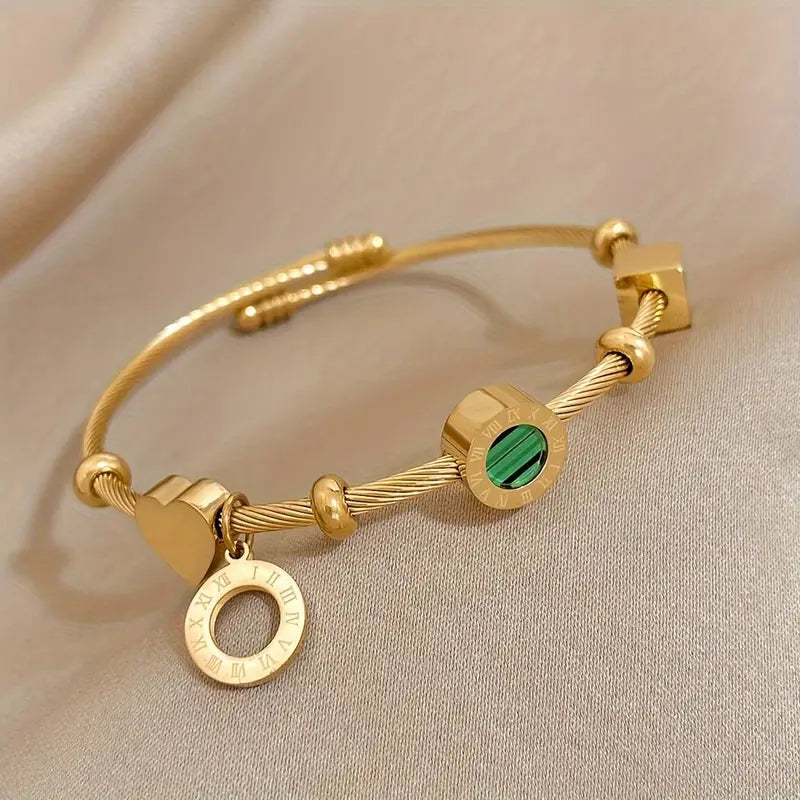 Rhian – Pulsera dorada de firma