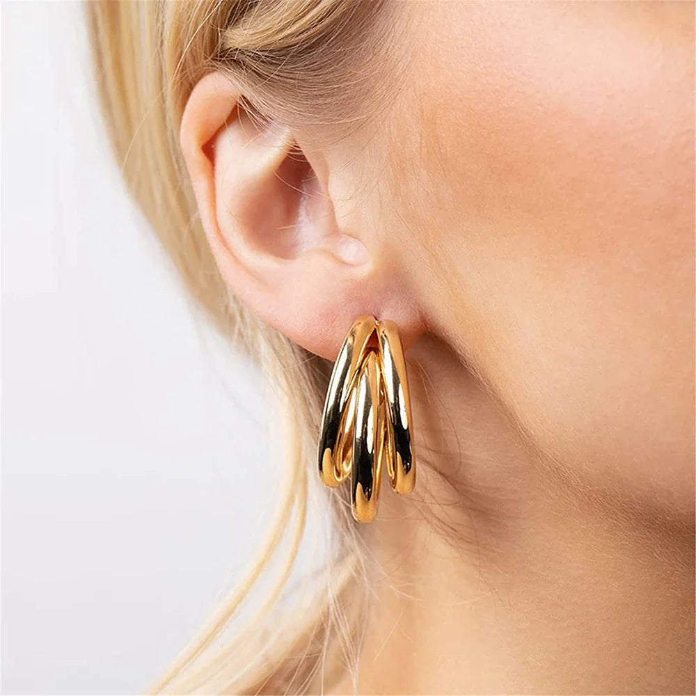 Aro de tres ruedas - 3 aros dorados