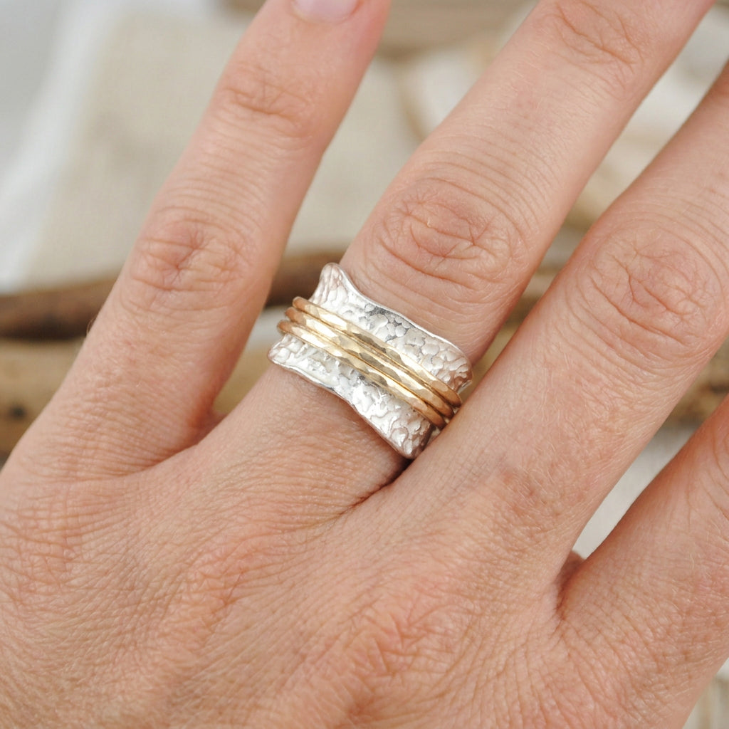 Bianca - Anillo giratorio atemporal de oro y plata