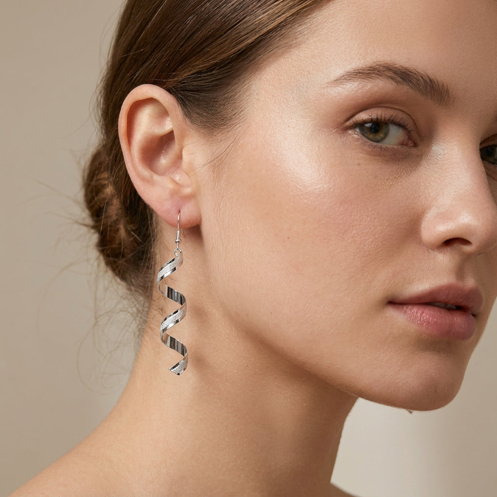 Jia – Pendientes espirales de plata brillantes