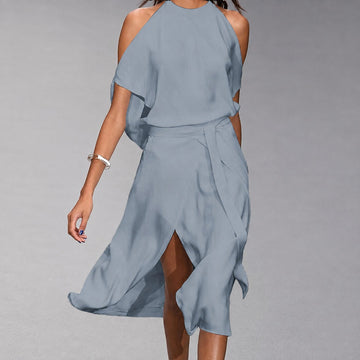 Madonnah - Un vestido aireado con cortes elegantes en los hombros
