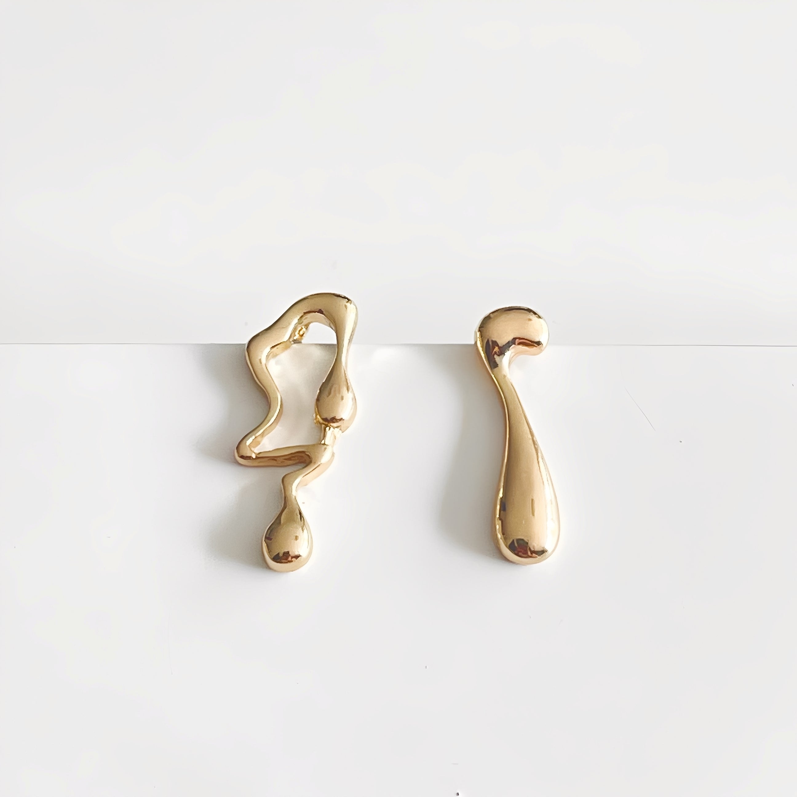 Wilma – Pendientes abstractos desiguales