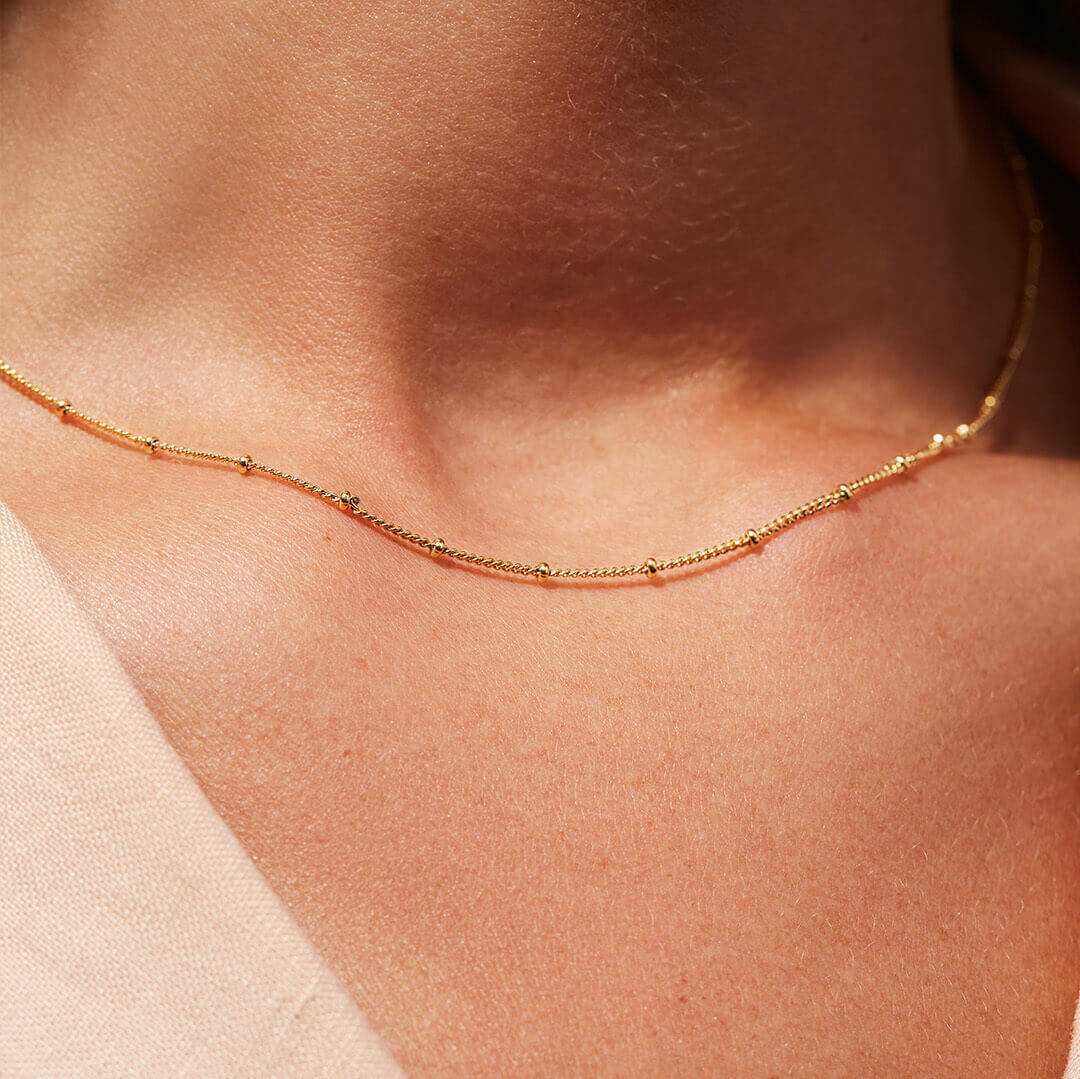 Reign - Collar de oro