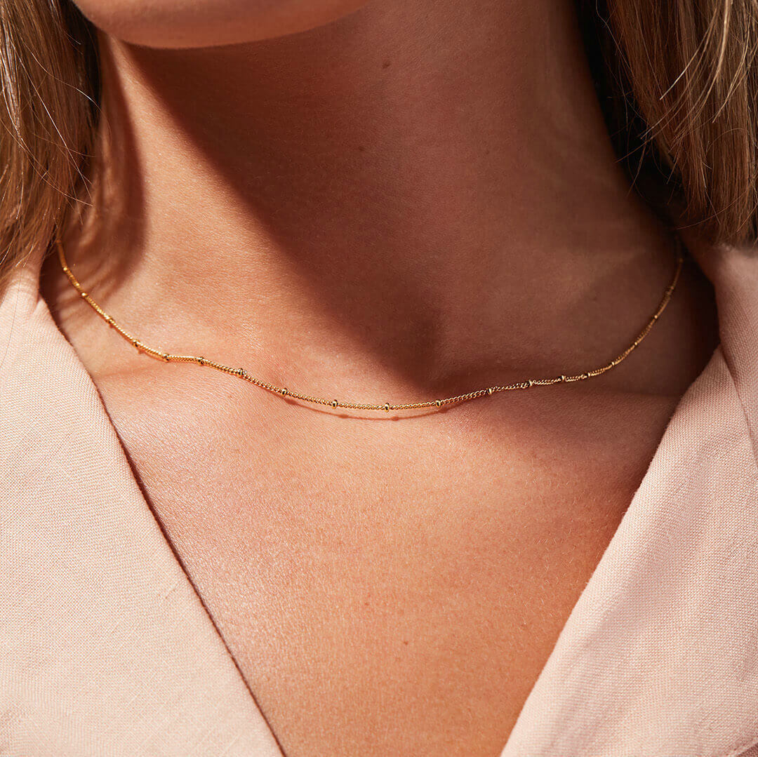 Reign - Collar de oro
