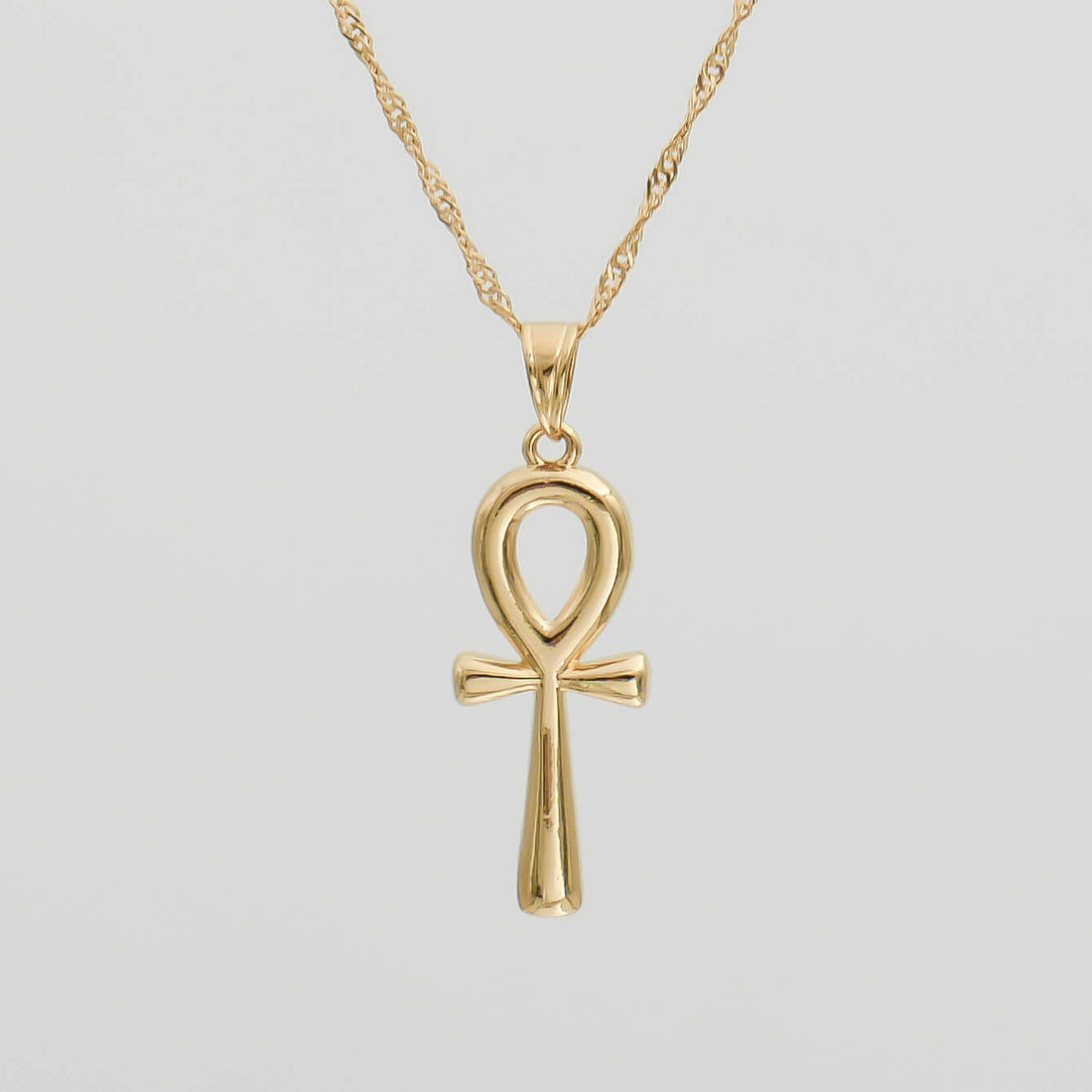 Stella – Colgante de cruz de metal
