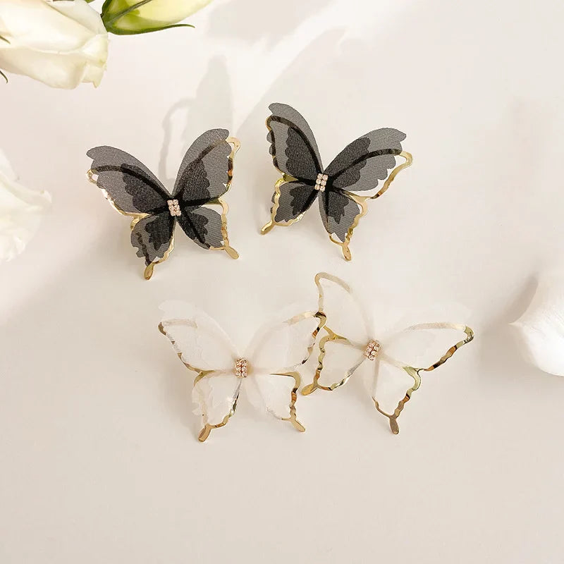 Jean – Pendientes de mariposa de trenzado ligero