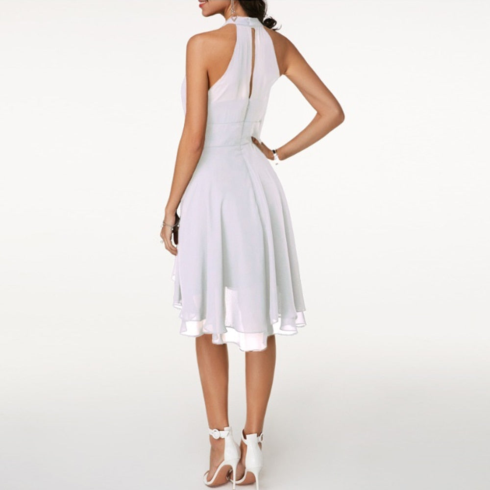 Loren - Vestido elegante con volantes