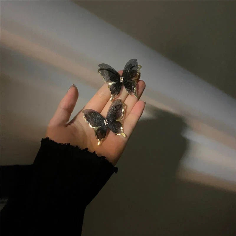 Jean – Pendientes de mariposa de trenzado ligero