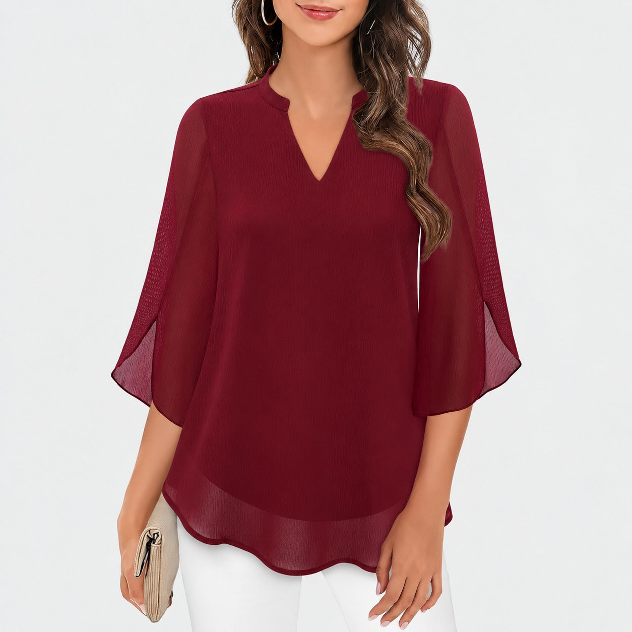 Ella - Blusa aireada con llamativas aberturas en las mangas