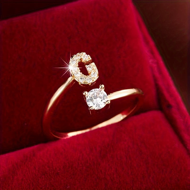 Nova – Anillo abierto moderno con inicial y circonitas