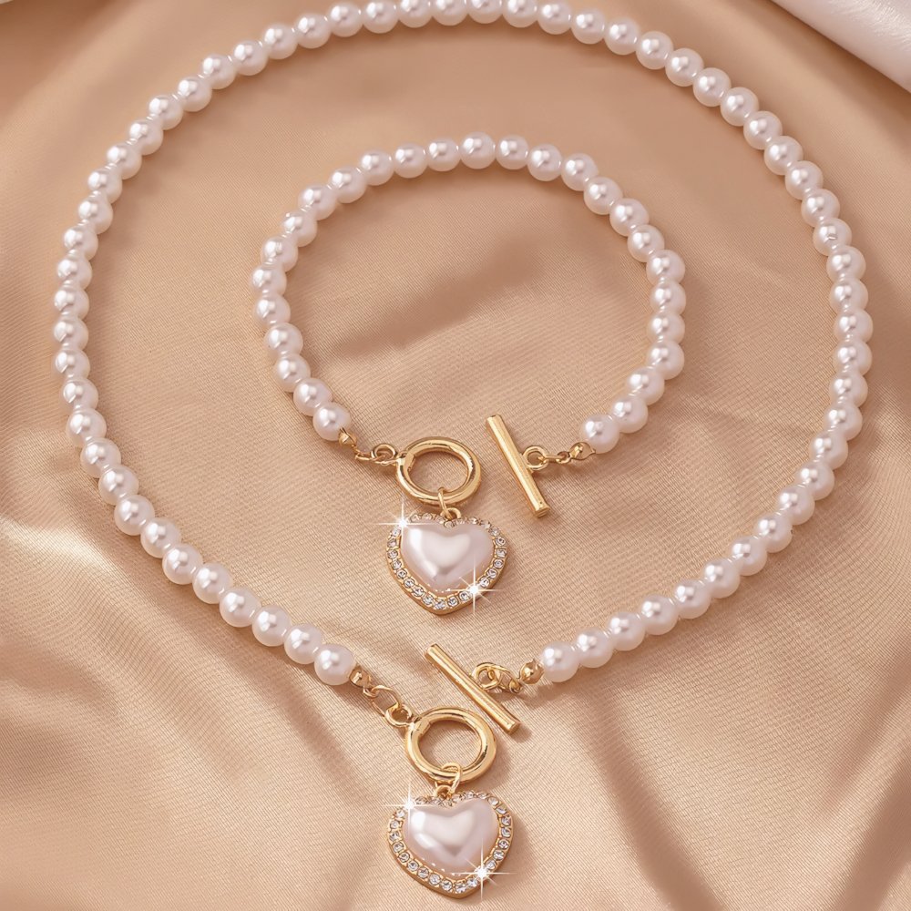 Lara – Conjunto de collar y pulsera Corazón Perlé