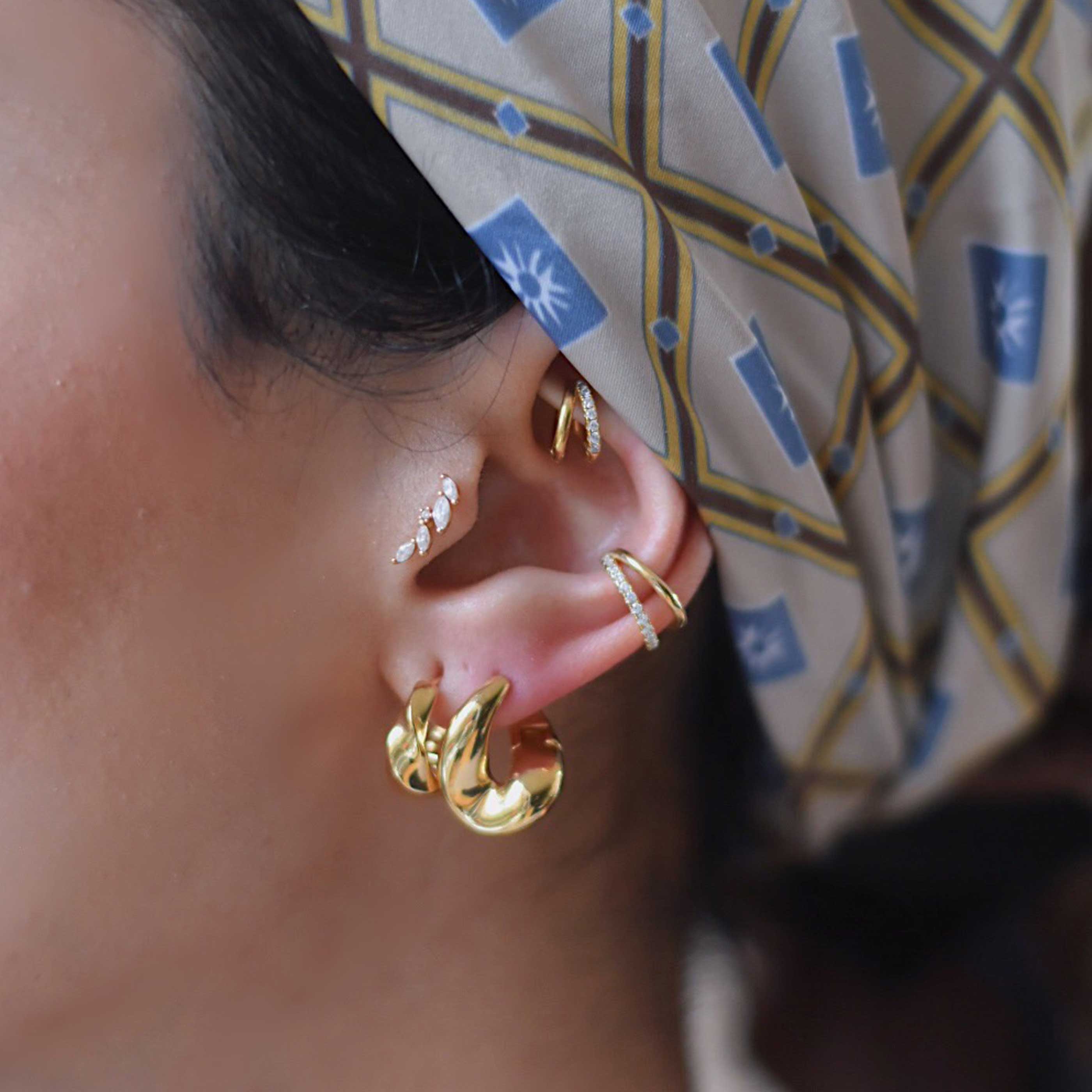 Kelly – Manguito de oreja dorado