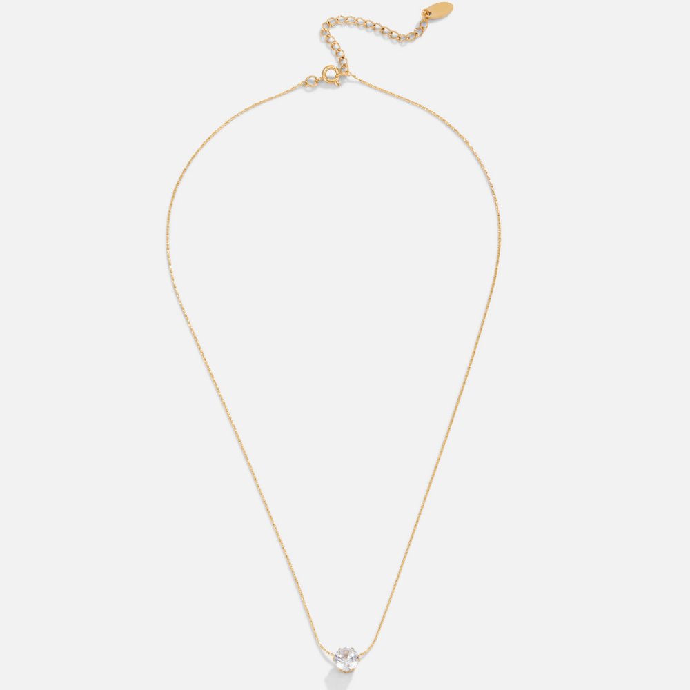 Amaris – Collar dorado con cristal redondo elegante