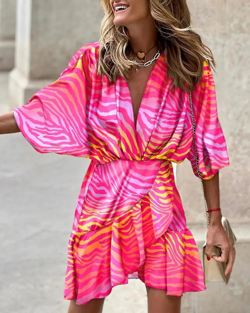 Niana - Vestido con escote en V elegante y estampado vivo
