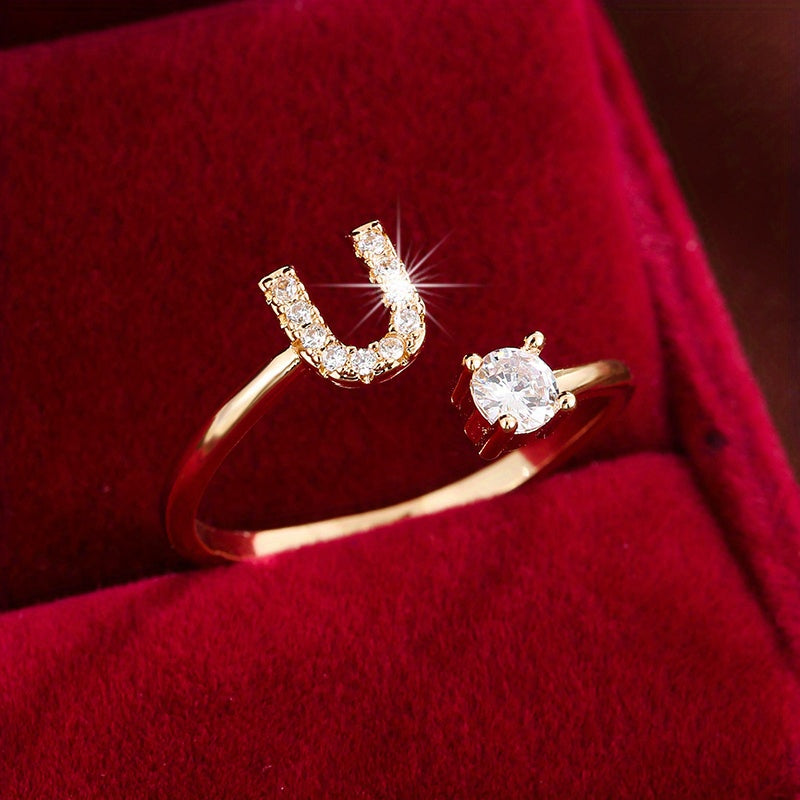 Nova – Anillo abierto moderno con inicial y circonitas