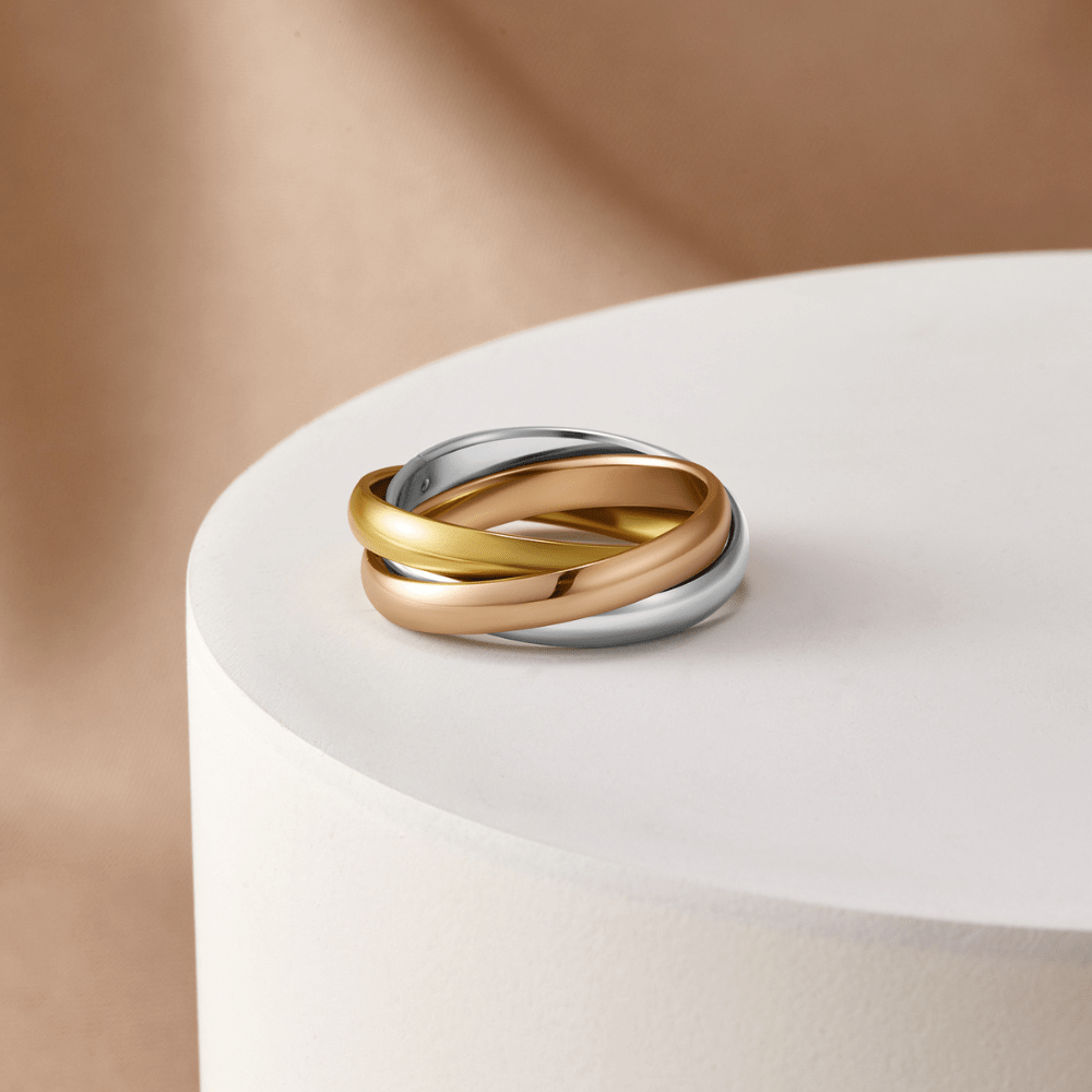 Elena – Anillo triple elegante en tres tonos