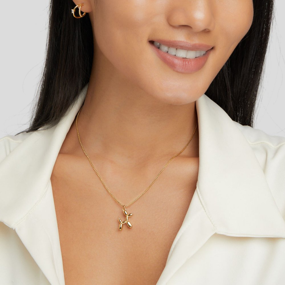 Nerina – Collar con colgante de perro y globo dorado