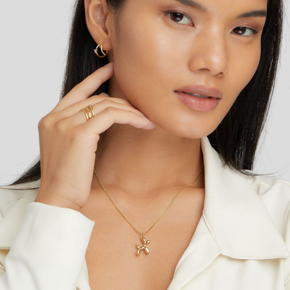 Nerina – Collar con colgante de perro y globo dorado