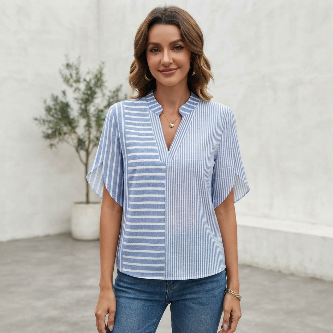 Blusa de mujer con cuello mandarina notch formando escote en V, mangas 3/4 y abertura lateral
