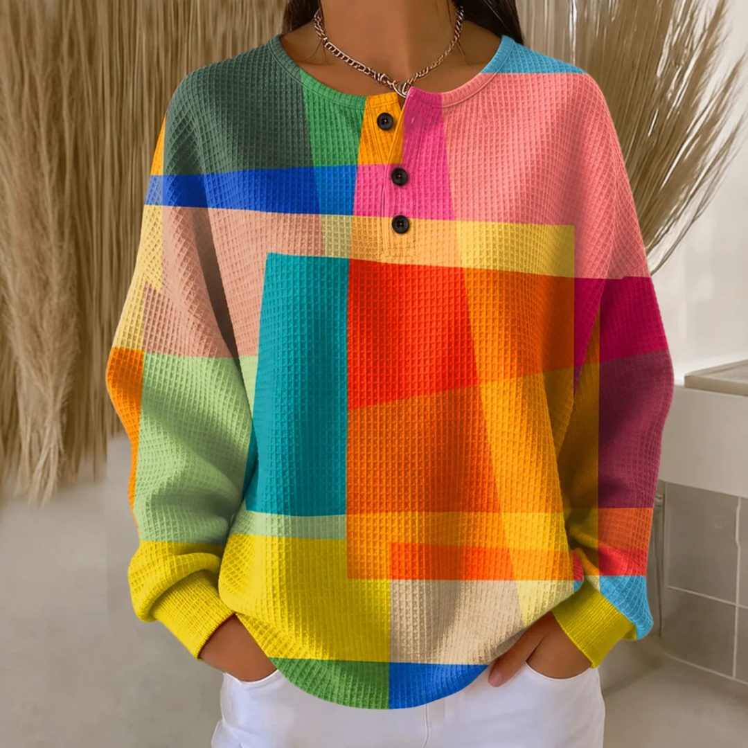 Blusa Henley para mujer con estampado en bloques geométricos - cuello redondo con abertura de 3 botones, manga larga, silueta tunic relajada