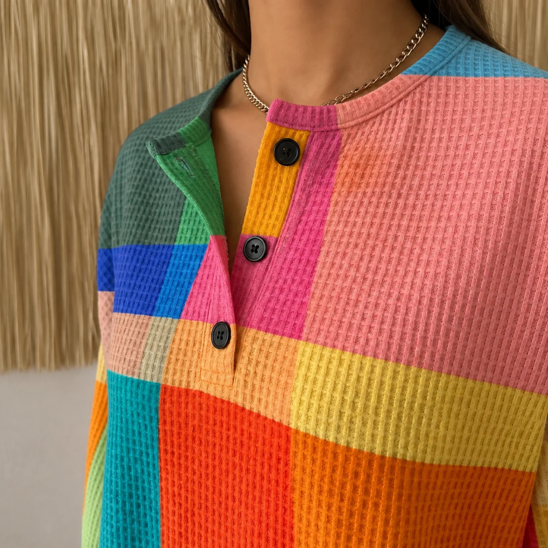 Blusa Henley para mujer con estampado en bloques geométricos - cuello redondo con abertura de 3 botones, manga larga, silueta tunic relajada