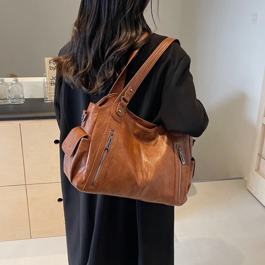 Bolso bandolera para mujer con múltiples compartimentos y diseño versátil