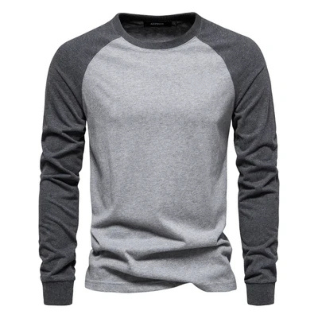Camiseta raglán de manga larga para hombre con mangas en contraste, cuello redondo, ajuste entallado, logotipo en el pecho