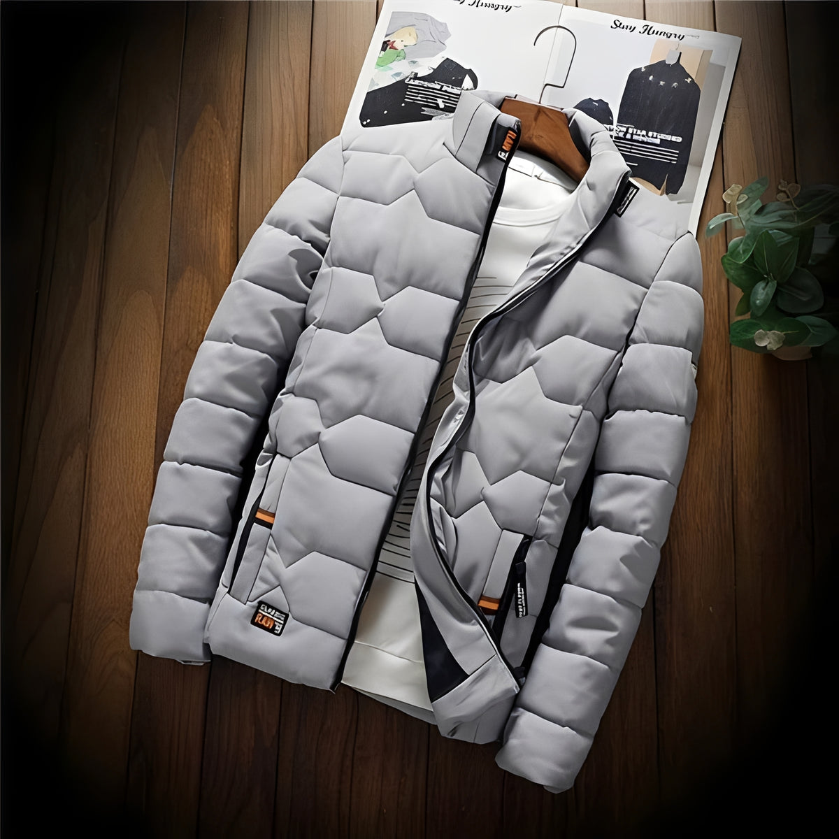 Chaqueta acolchada para hombre con costuras geométricas y bolsillos con cremallera