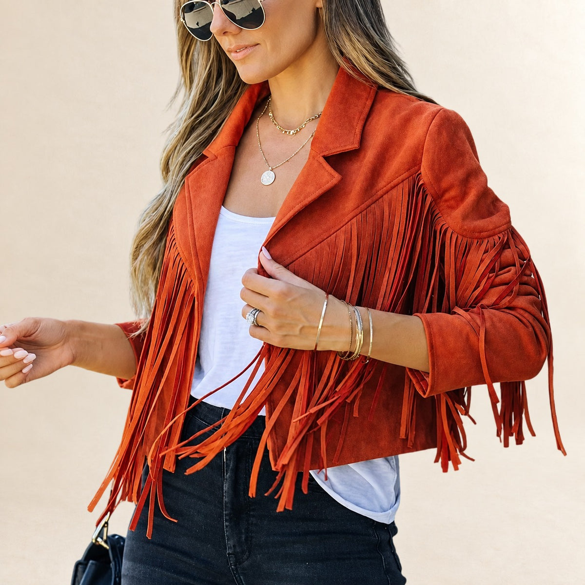 Chaqueta corta para mujer con flecos y solapa