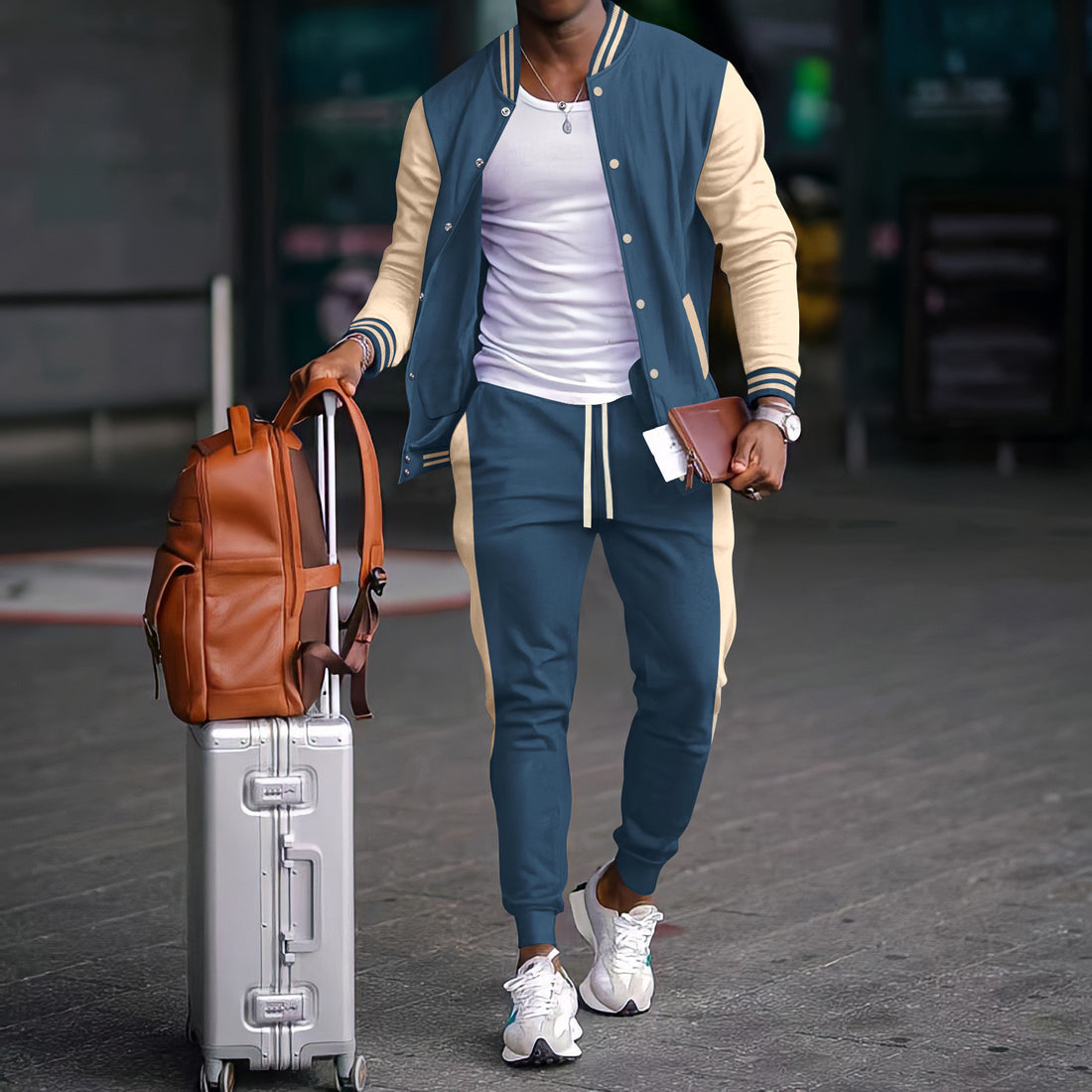Conjunto deportivo para hombre con chaqueta tipo varsity de bloques de color y pantalones jogger