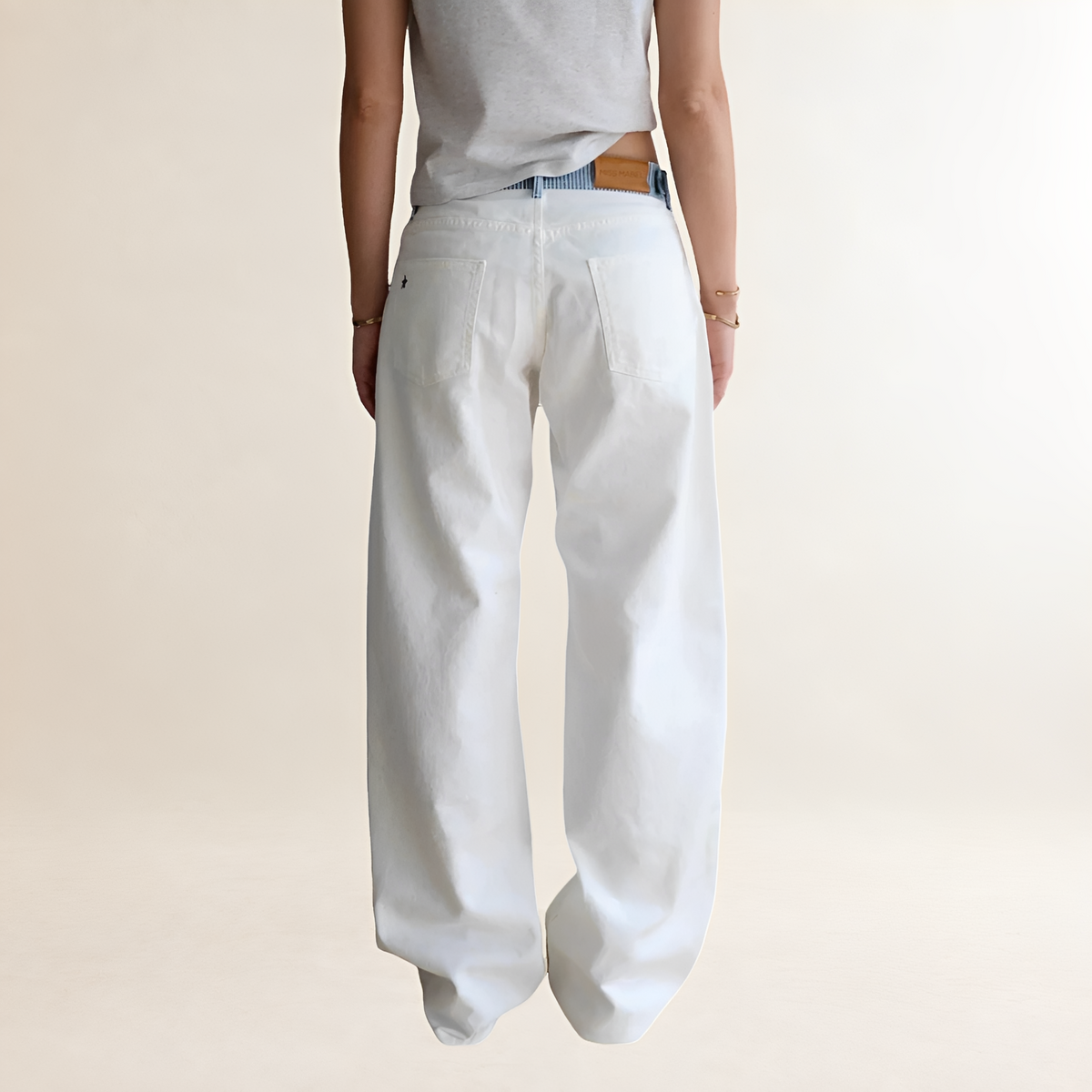 Jeans mujer de pierna ancha cintura contrastada corte relajado