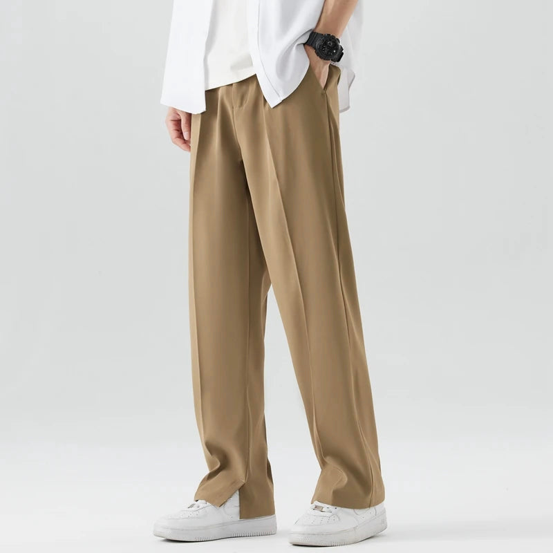 Pantalones de corte ancho para hombre con bolsillos laterales y cintura con botón