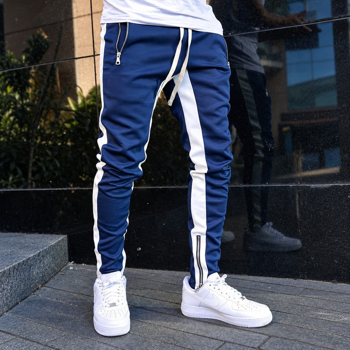 Pantalones jogger para hombre con rayas laterales de contraste y bolsillos con cremallera