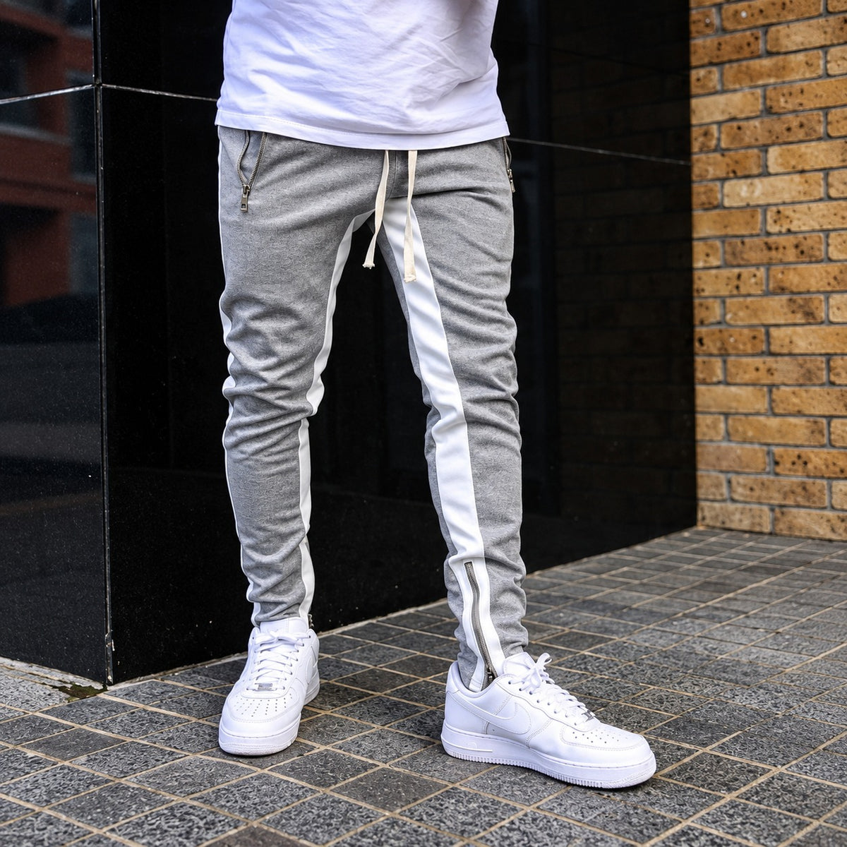 Pantalones jogger para hombre con rayas laterales de contraste y bolsillos con cremallera