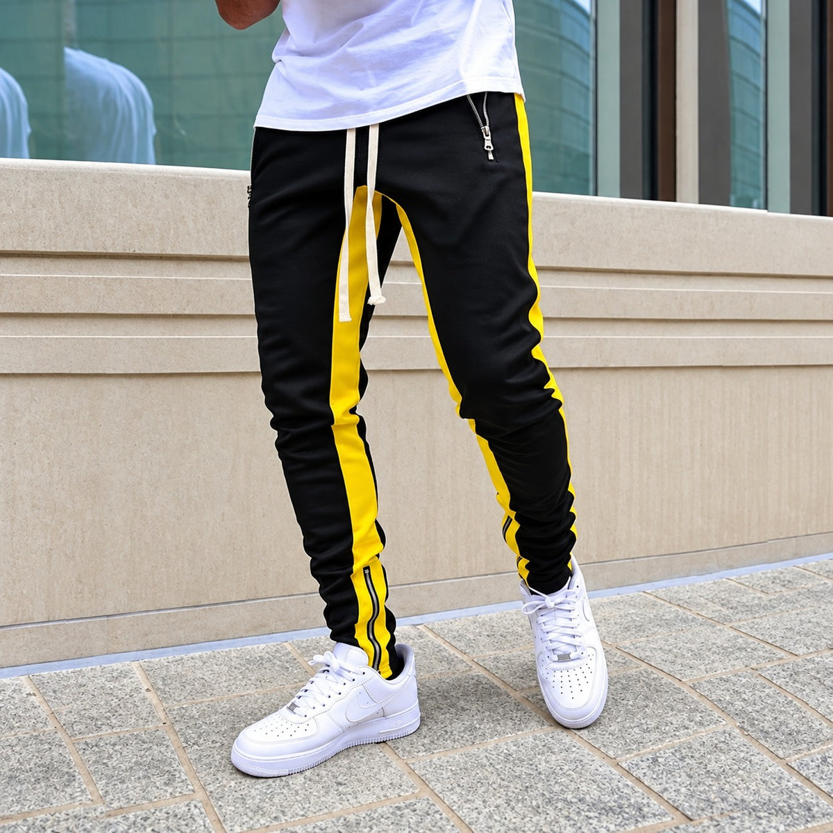 Pantalones jogger para hombre con rayas laterales de contraste y bolsillos con cremallera