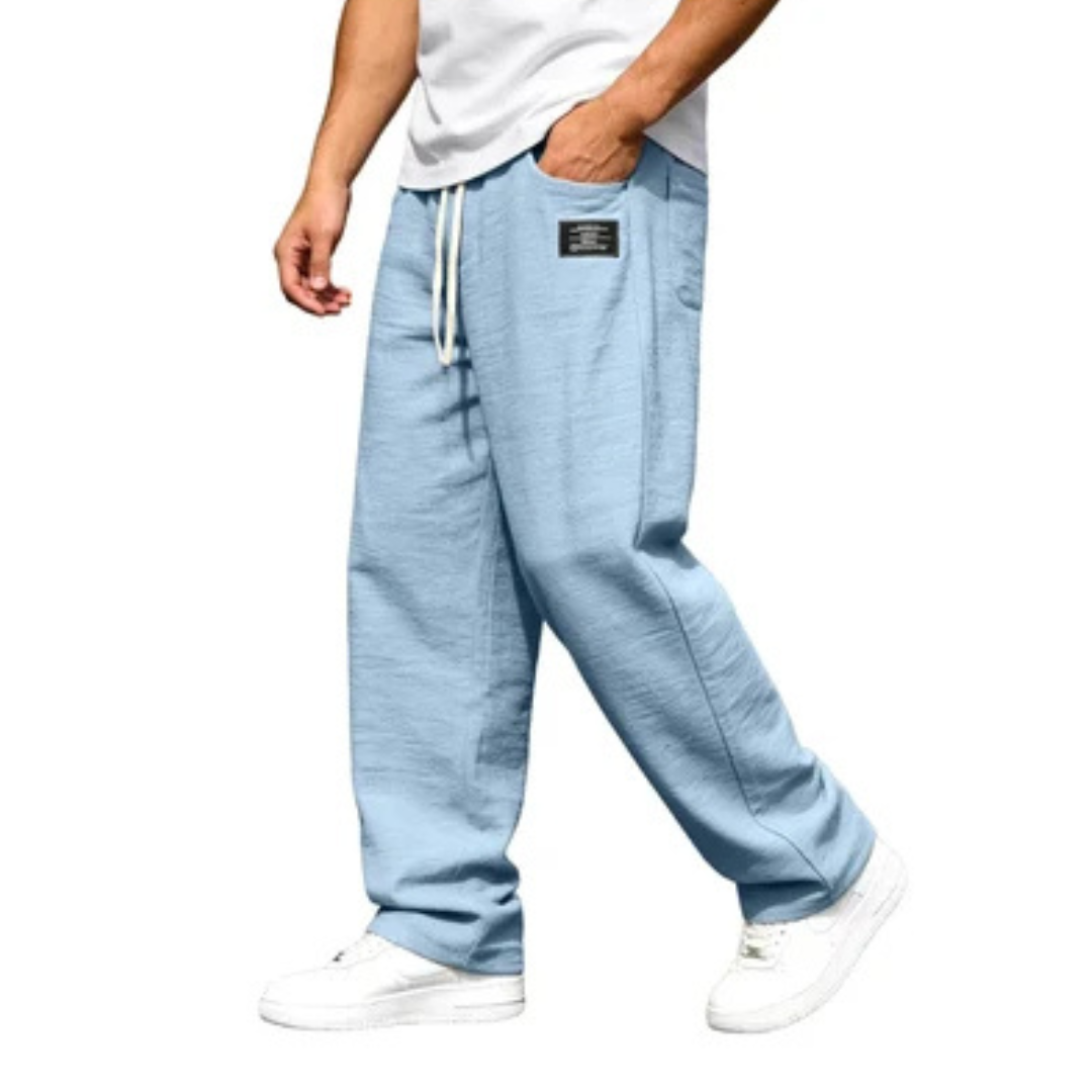 Pantalones rectos para hombre, tiro relajado con cintura elástica y cordón - bolsillos laterales, detalle de parche