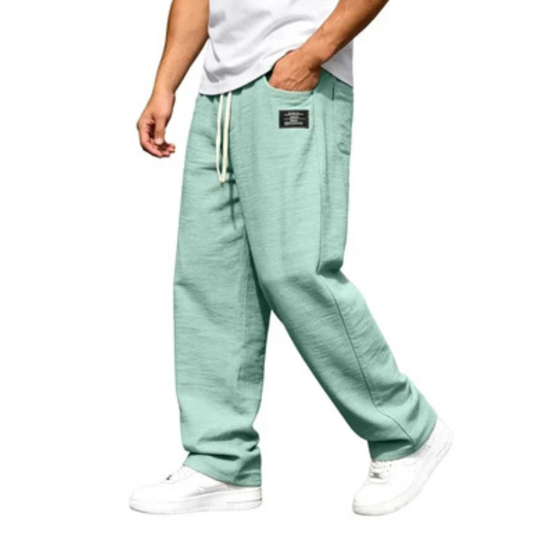 Pantalones rectos para hombre, tiro relajado con cintura elástica y cordón - bolsillos laterales, detalle de parche