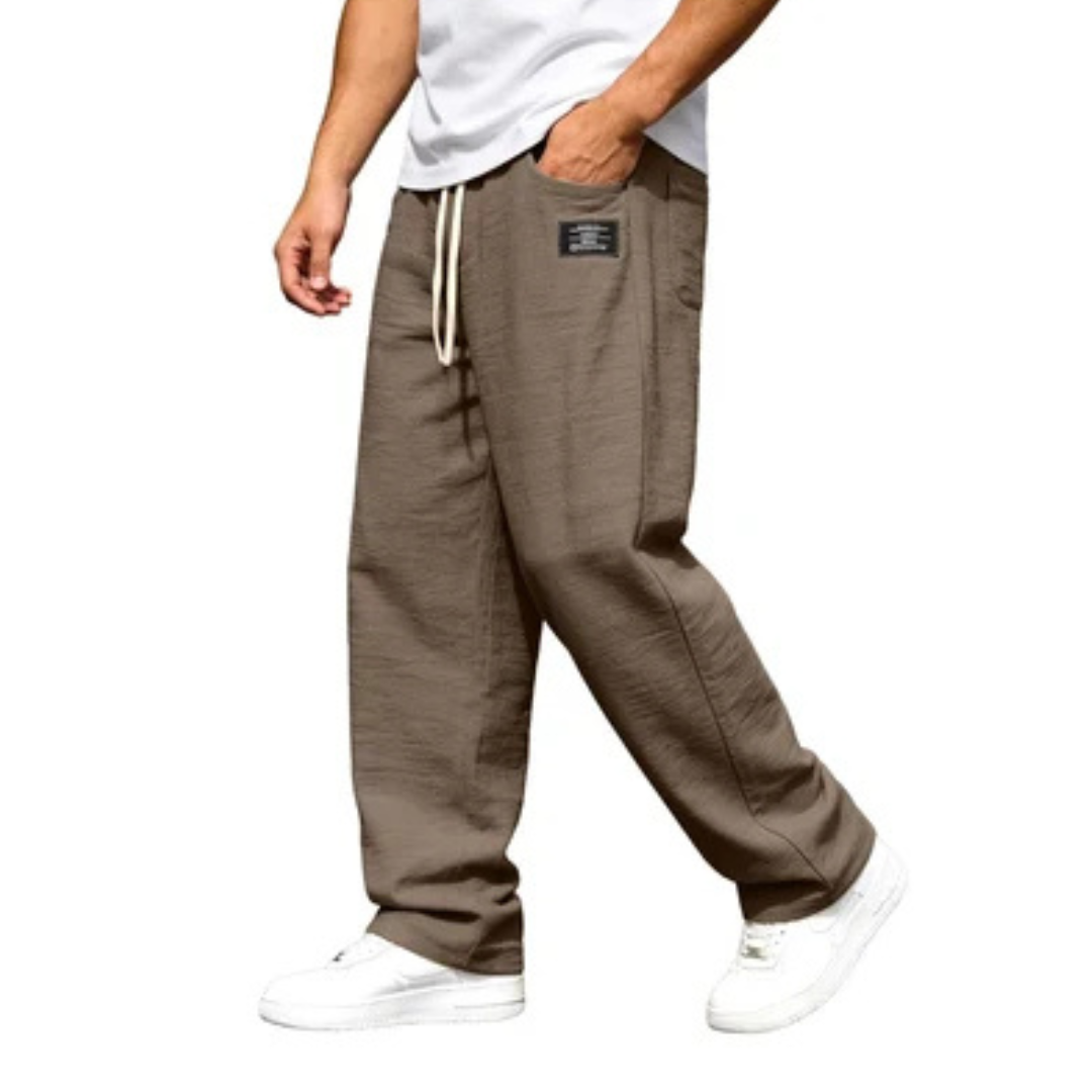 Pantalones rectos para hombre, tiro relajado con cintura elástica y cordón - bolsillos laterales, detalle de parche