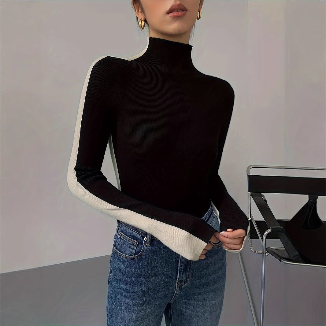 Top de mujer de manga larga con cuello mock, diseño en bloques de color y corte regular