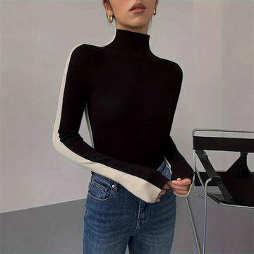 Top de mujer de manga larga con cuello mock, diseño en bloques de color y corte regular