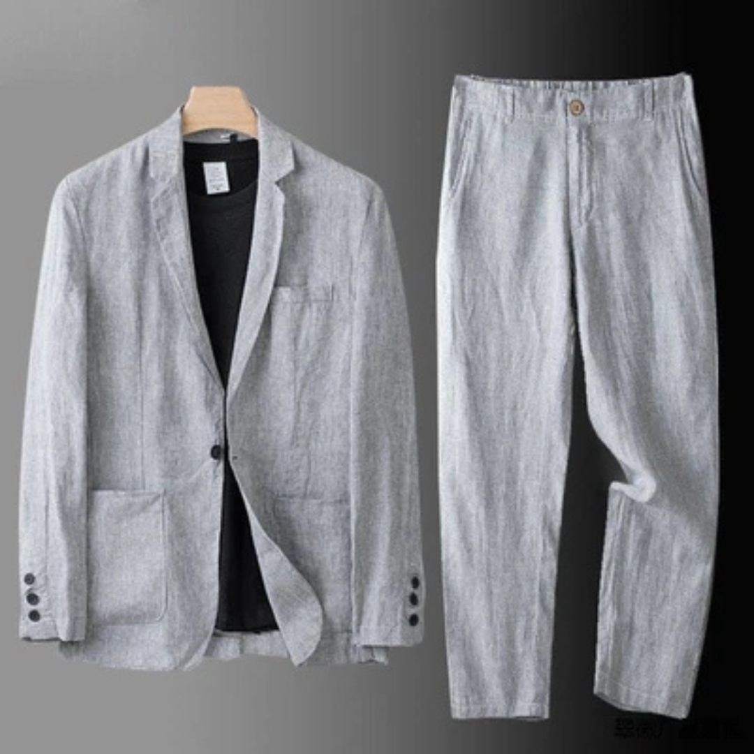 Traje de hombre: saco cruzado de un solo botón con solapas inclinadas y bolsillos parche, pantalón recto con cintura elástica
