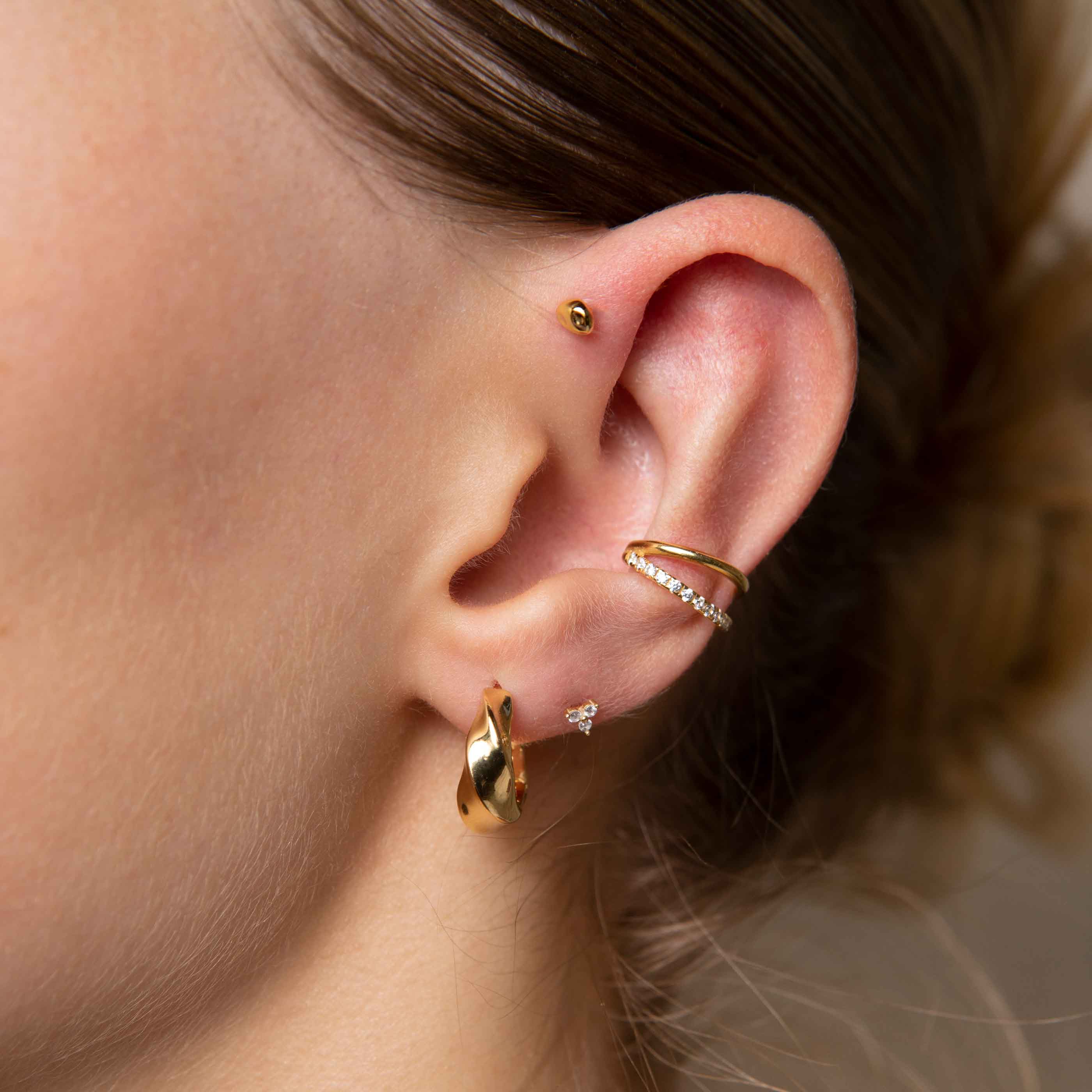 Kelly – Manguito de oreja dorado