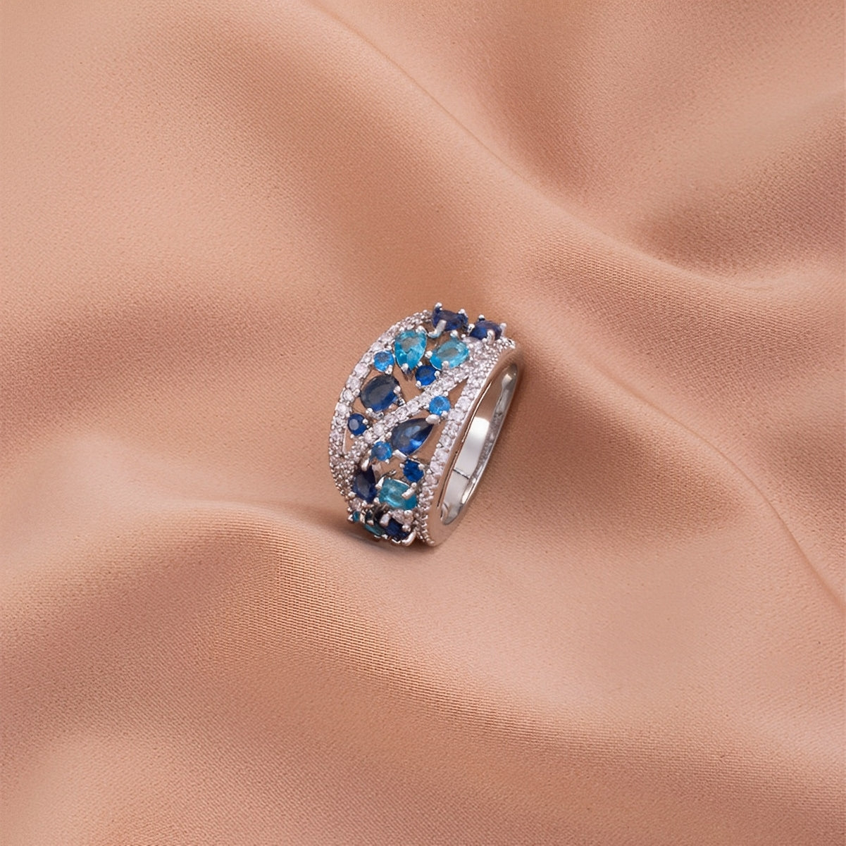 Julie – Anillo vintage con zirconia azul y detalle dorado