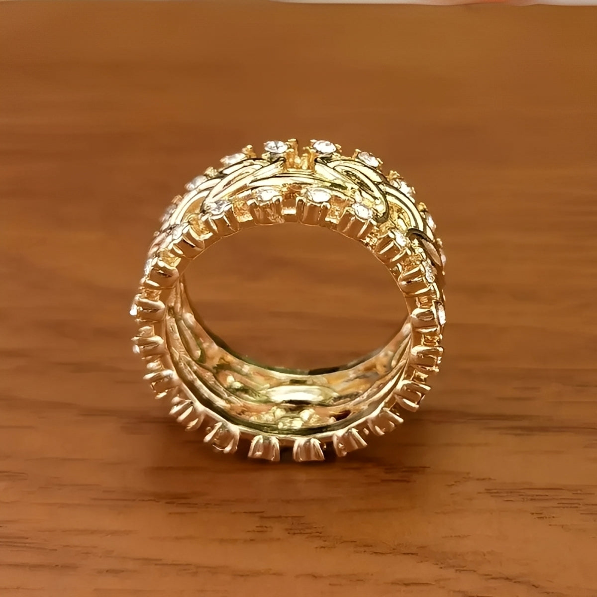 Lydia – Joya de oro trenzado con circonitas